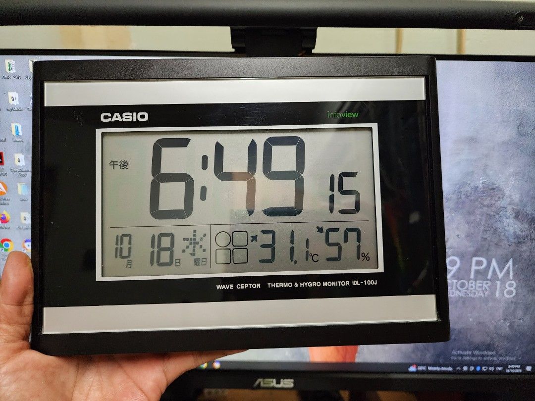 Casio wall ,table clock. (Category: Clocks) located in Johor Bahru. Submitted by chaplang-house (Listing ID 1260935628, Image 1). Description: Nice tell time piece as it has..... Time/Calendar/Temperature and Humidity display. Size 10 in x 7 in x 1 in Operates with twin AA batteries. no cod, tq..