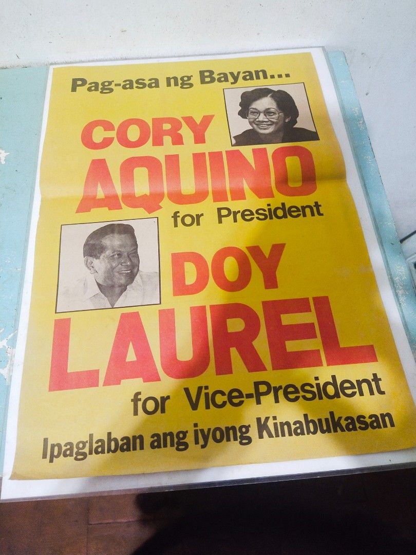 CORY & DOY Original Campaign Poster/1986/Extremely-RARE! (Category: Vintage Collectibles) located in Del Monte. Submitted by zurckram777 (Listing ID 1260921491, Image 1). Description: ORIGINAL campaign poster of CORY (Aquino) and DOY (Laurel). This newsprint poster was made especially for the so-called "Snap Elections" scheduled for Feb.7, 1986. (We all know who won and the controversies following it). Measures 16 by 12 inches. Has signs of age-i