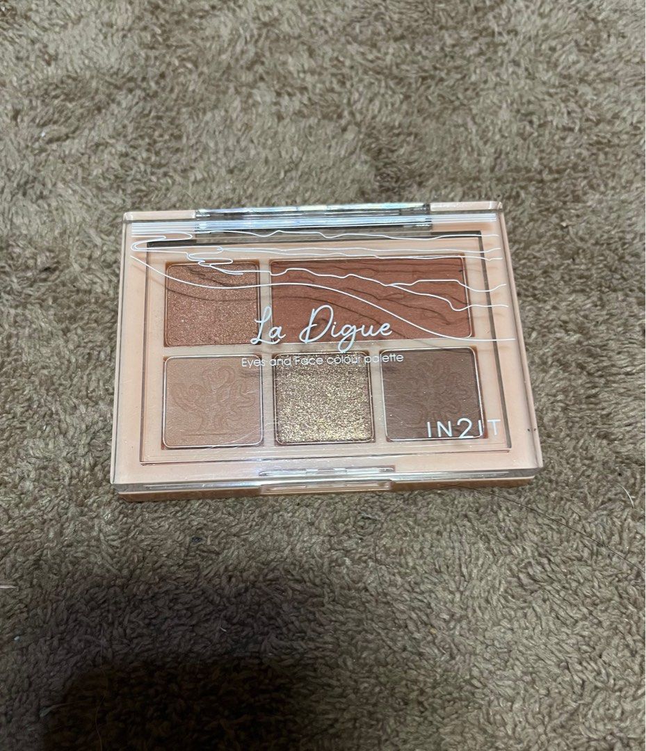 in2it face and eyeshadow palette (Category: Makeup) located in Taguig. Submitted by hanzdeclutter (Listing ID 1260961888, Image 1). Description: lighest shade lng used glitters never nagalaw other shades, swatched only :) bought it march 2024 can be used as blush, contour and eyeshadow bought it ₱550 RFS: declutter.