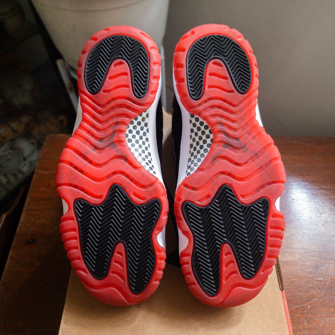 Jordan 11 low deals orange 2019