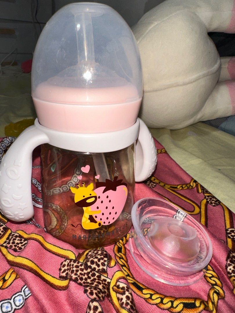 Marcus&Marcus PPSU transition trainer bottle set (Category: Breastfeeding & Bottle Feeding) located in Cavite. Submitted by mommyjhaiiii (Listing ID 1260969309, Image 2). Description: Used once ayaw ni LO. Bought 1,199 at mall. .