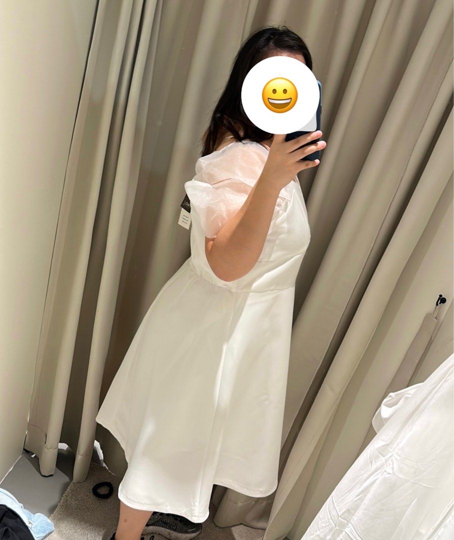 Full figure white dress store