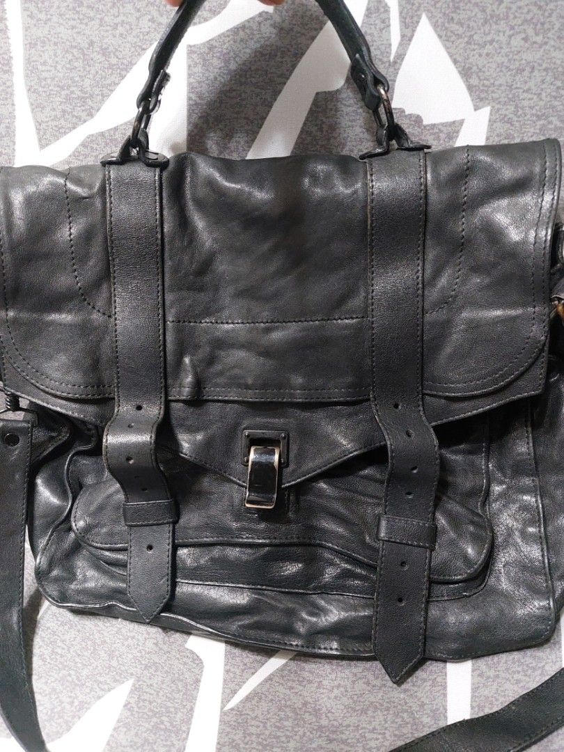 Proenza Schouler black (Category: Luxury Bags & Wallets) located in Manila. Submitted by yanakolekzione (Listing ID 1260937342, Image 1). Description: original Proenza Schouler medium PS1 last photo is for reference only it has flaws, it needs to be repair thus selling low.