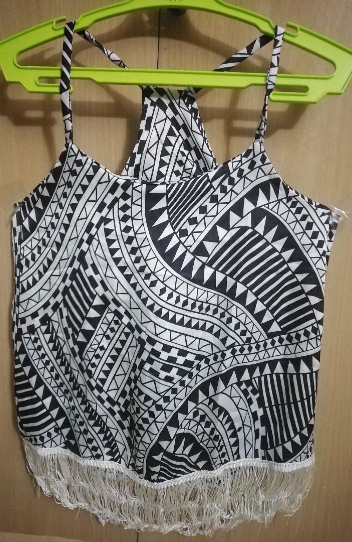 SEXY SLEEVELESS TOP (Category: Sleeveless) located in Taguig. Submitted by juls0607 (Listing ID 1260932101, Image 3). Description: 1. Sexy Sleeveless, small (worn once) Satin texture with brown flower design Brand: Parfait from SM Dept store ladies section Nice for petite body Price: Php130.00 (original price Php500.00) 2. Sexy Sleeveless, small Satin texture with aztec black and white design Nice for petite body Price: Php100.00.
