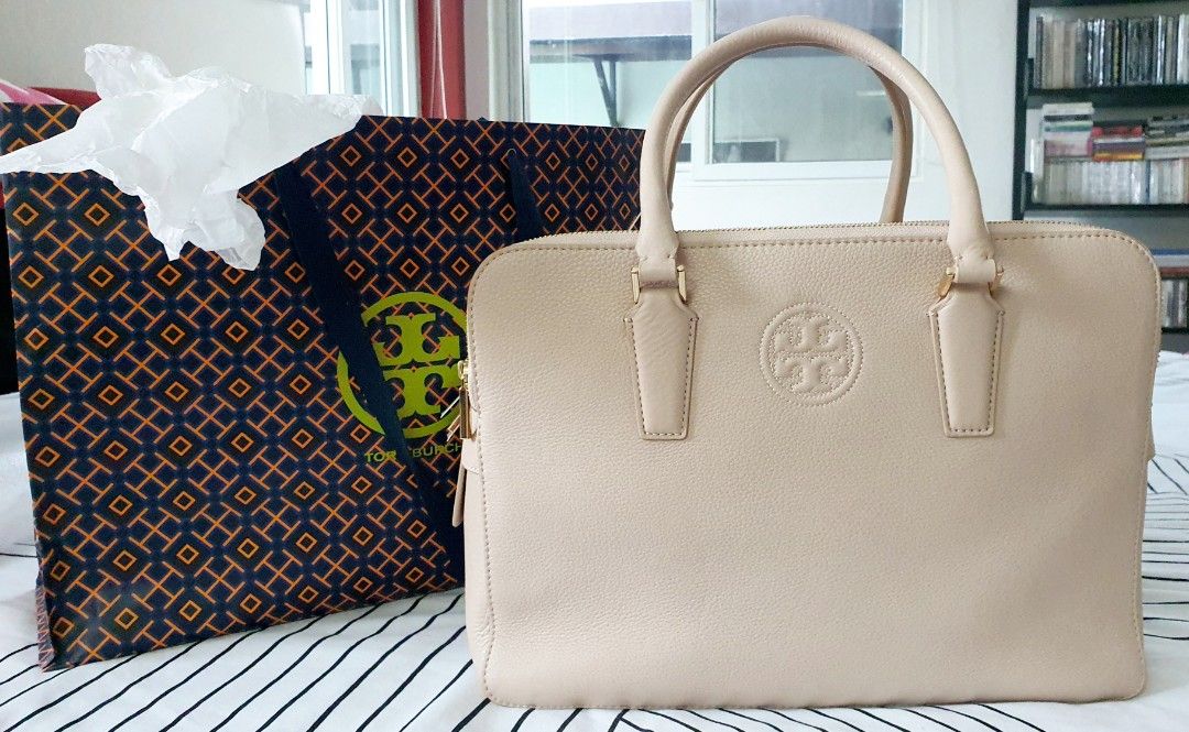 BRAND NEW Tory Burch Bag (Category: Luxury Bags & Wallets) located in Bulacan. Submitted by stardust017 (Listing ID 1257940978, Image 1). Description: Brand New with tag - Tory Burch Marion Triple Zip Satchel in Light Oak Color Bought in the US, guaranteed authentic Kindly message me if you want additional photos of the bag including the interior offers are welcome, price negotiable.