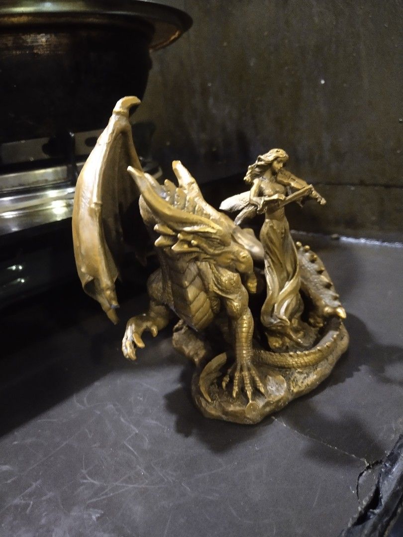 Brass flying dragon with musician statue display (Category: Vintage Collectibles) located in Manila. Submitted by kurukutuk (Listing ID 1257989748, Image 3). Description: brass flying dragon with musician statue display 7 x 6.5 inches HxL made of brass.