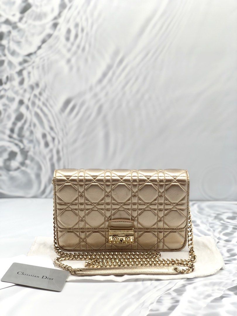 Dior best sale gold clutch