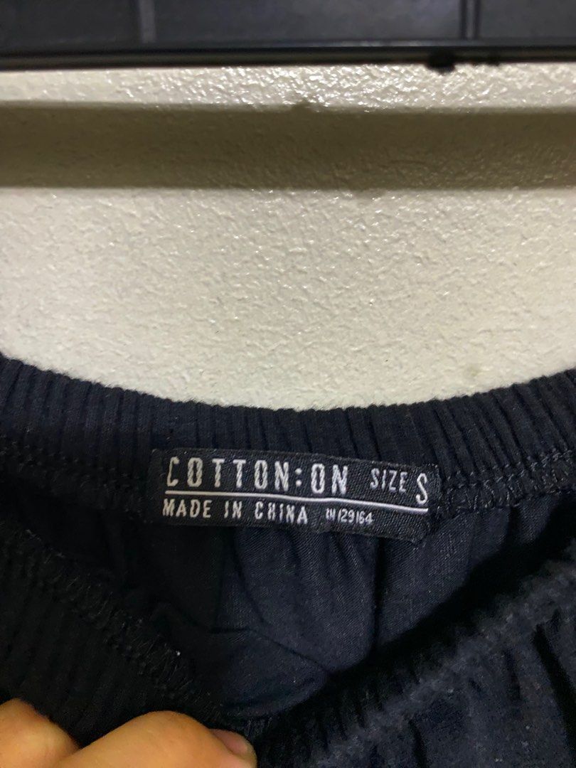 Cotton on up shoulder black top (Category: Blouses) located in Taguig. Submitted by _glamistbyrish (Listing ID 1258017114, Image 2). Description: Cotton on up shoulder black top Small on tag Cotton fabric Color rate: 10/10 Good quality No issue 149 Php.