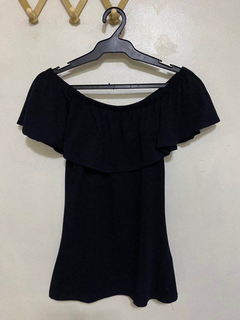 Cotton on up shoulder black top (Category: Blouses) located in Taguig. Submitted by _glamistbyrish (Listing ID 1258017114, Image 1). Description: Cotton on up shoulder black top Small on tag Cotton fabric Color rate: 10/10 Good quality No issue 149 Php.