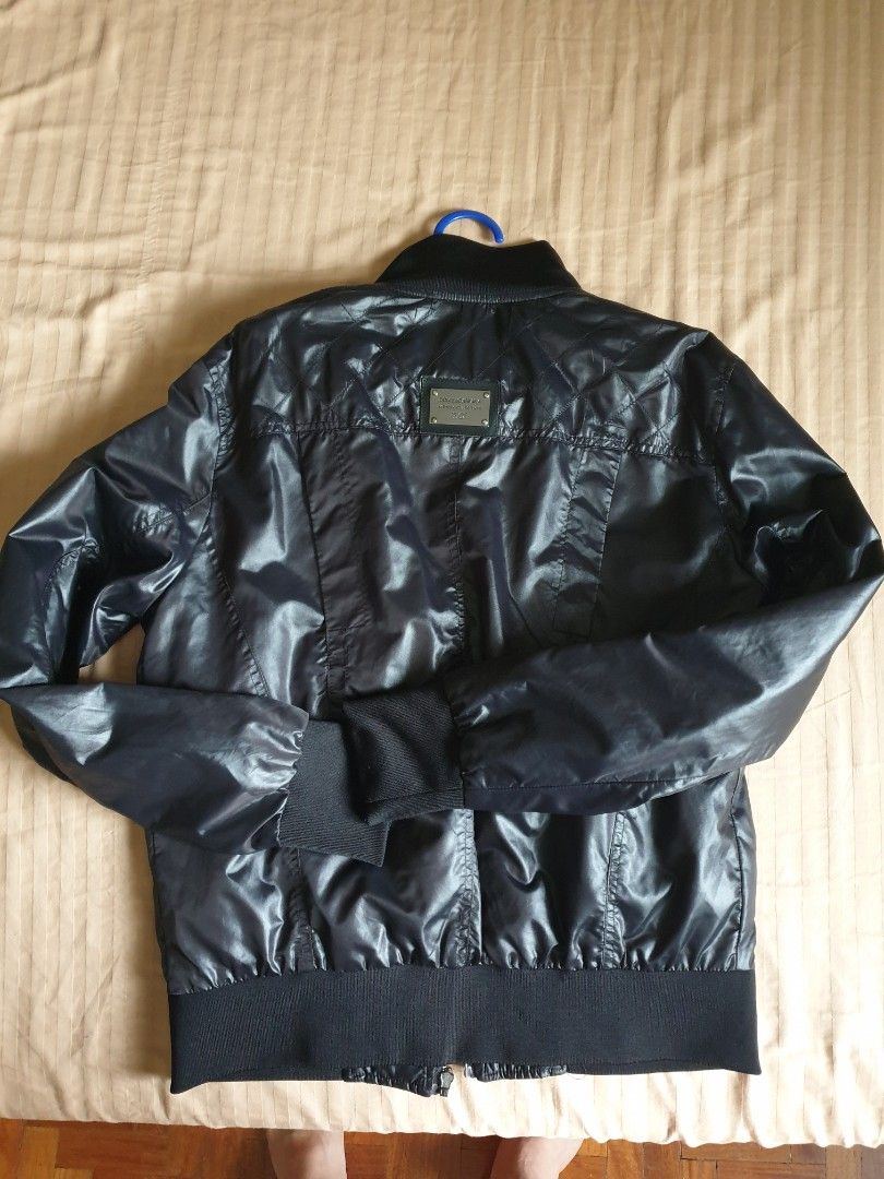 Dolce and Gabbana Black Synthetic Bomber Jacket (Category: Coats, Jackets and Outerwear) located in Quezon City. Submitted by cblamb (Listing ID 1257960746, Image 2). Description: Black synthetic bomber jacket Code: G3S9TD / G8112 RFS: decluttering *must see.
