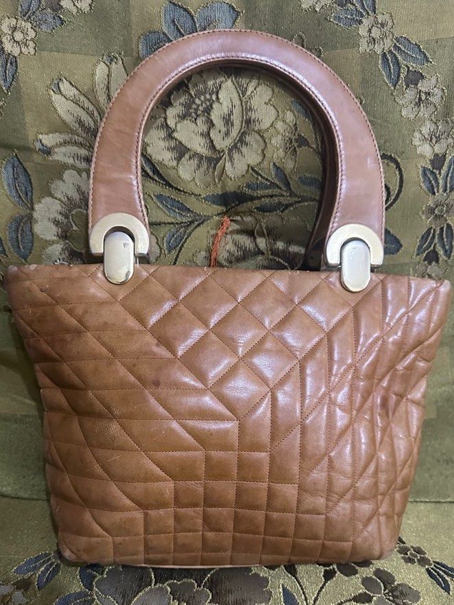 Francesco Italy Bag (Category: Luxury Bags & Wallets) located in Manila. Submitted by shopaholic_gurl (Listing ID 1257977174, Image 1). Description: Leather quilted bag Italy made Yellow leather Gold hardwares With normal signs of usage.
