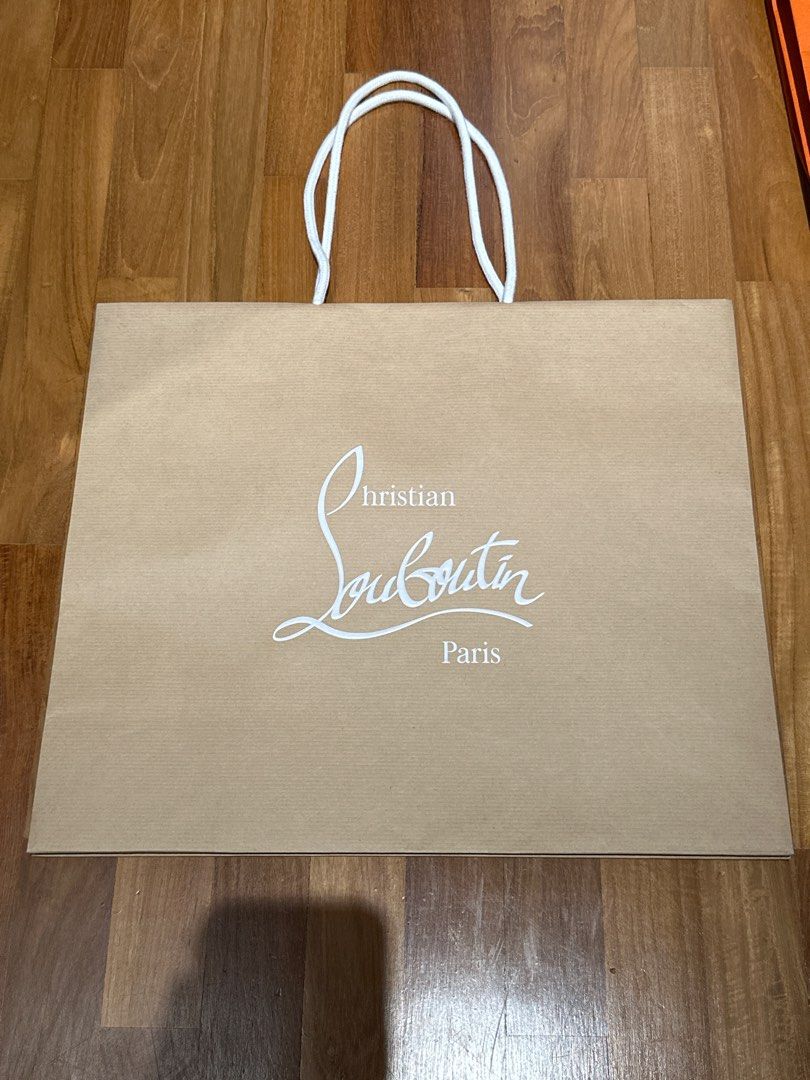 Louboutin paper bag on sale