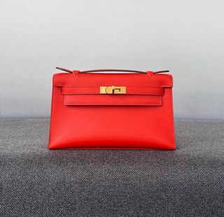 Hermès Ring Lizard Kelly Pochette with Gold Hardware. Condition: 2