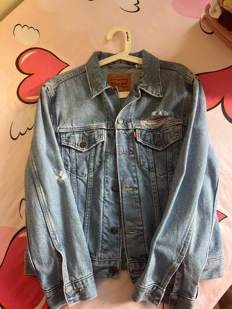 Levi's ripped denim jacket on sale