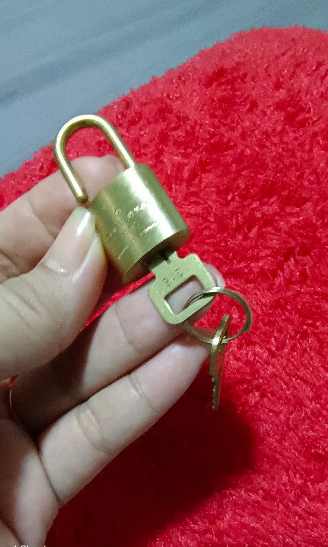 LV lockset no. 318, Luxury, Bags & Wallets on Carousell