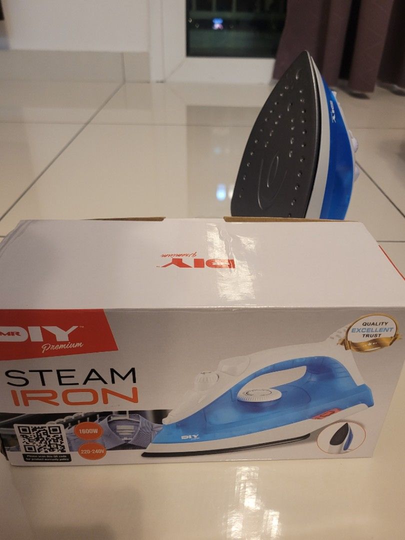 Second hand Mr DIY steam iron with iron board