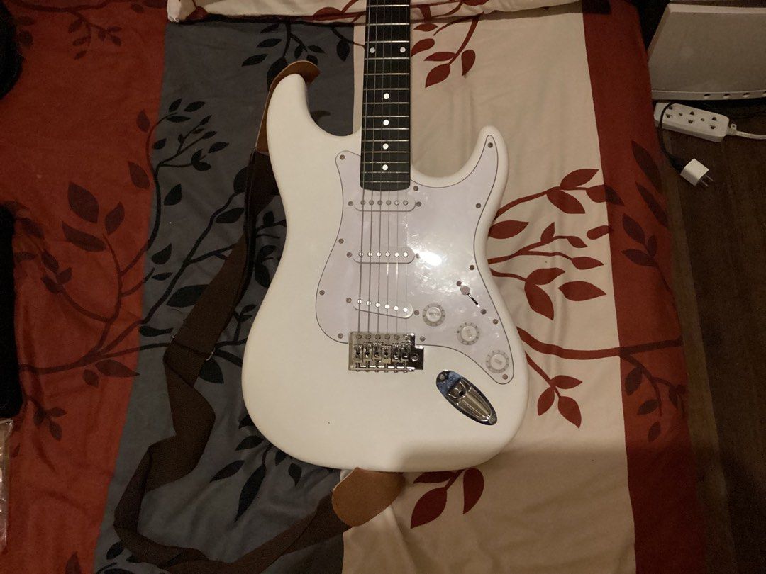THOMSON STRATOCASTER SWAP FOR IPHONE (Category: Musical Instruments) located in Makati City. Submitted by simonvilla115 (Listing ID 1258007450, Image 3). Description: FOR SWAP THOMSON STRATOCASTER TO IPHONE (offer nalang) WITH: - 2 cables - gm-215 Davis amplifier - digital tuner tt3 - set of electric guitar strings - 3 guitar picks - tools for adjusting - pick holder - Tremolo arm - Padded guitar case - fender guitar strap no scratches and no den