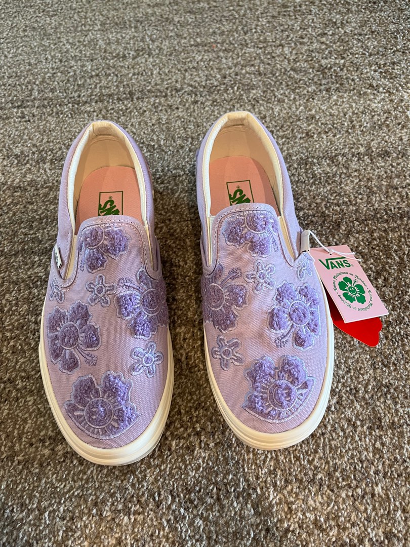 Purple and white deals slip on vans