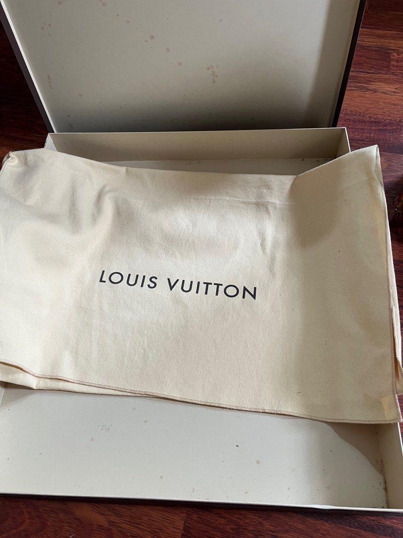 Louis Vuitton box with bag never been used authentic