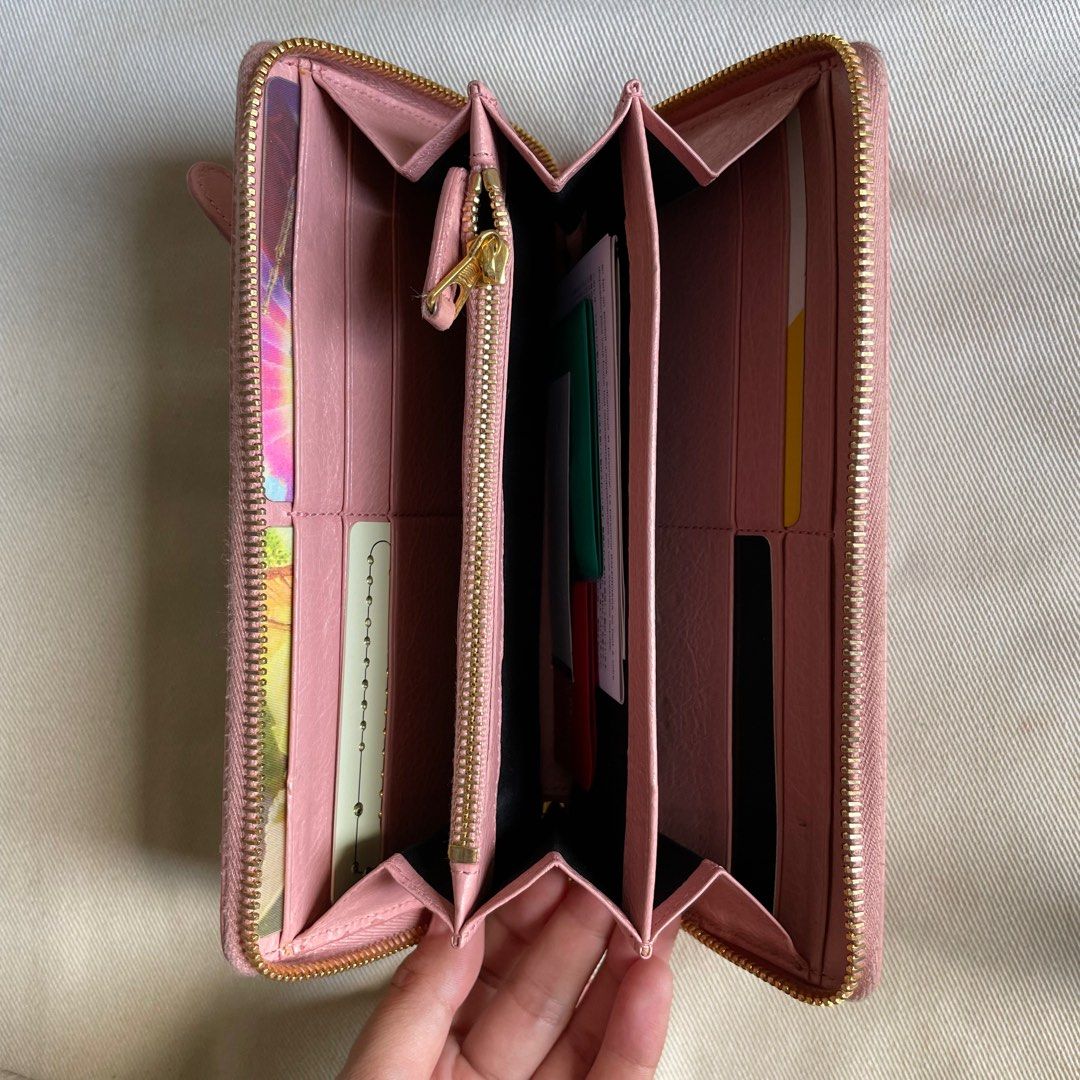 Balenciaga Continental Zipper Wallet (Category: Luxury Bags & Wallets) located in Quezon City. Submitted by patpotpit (Listing ID 1260995828, Image 2). Description: Classic style Spacious Great condition Slightly dirty .