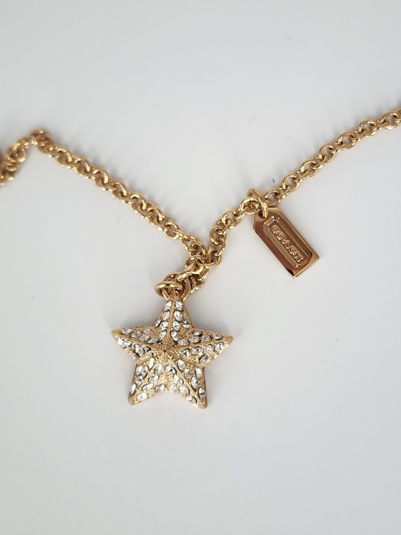 Brand new Coach F96340 Pave Pyramid Star Necklace w o box Women s
