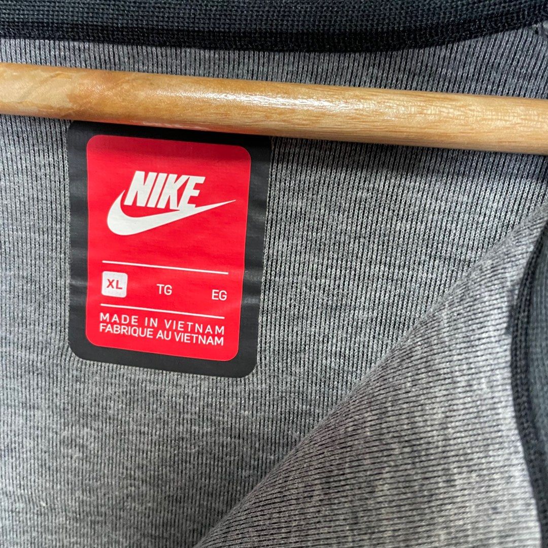 dark gray nike tech fleece
