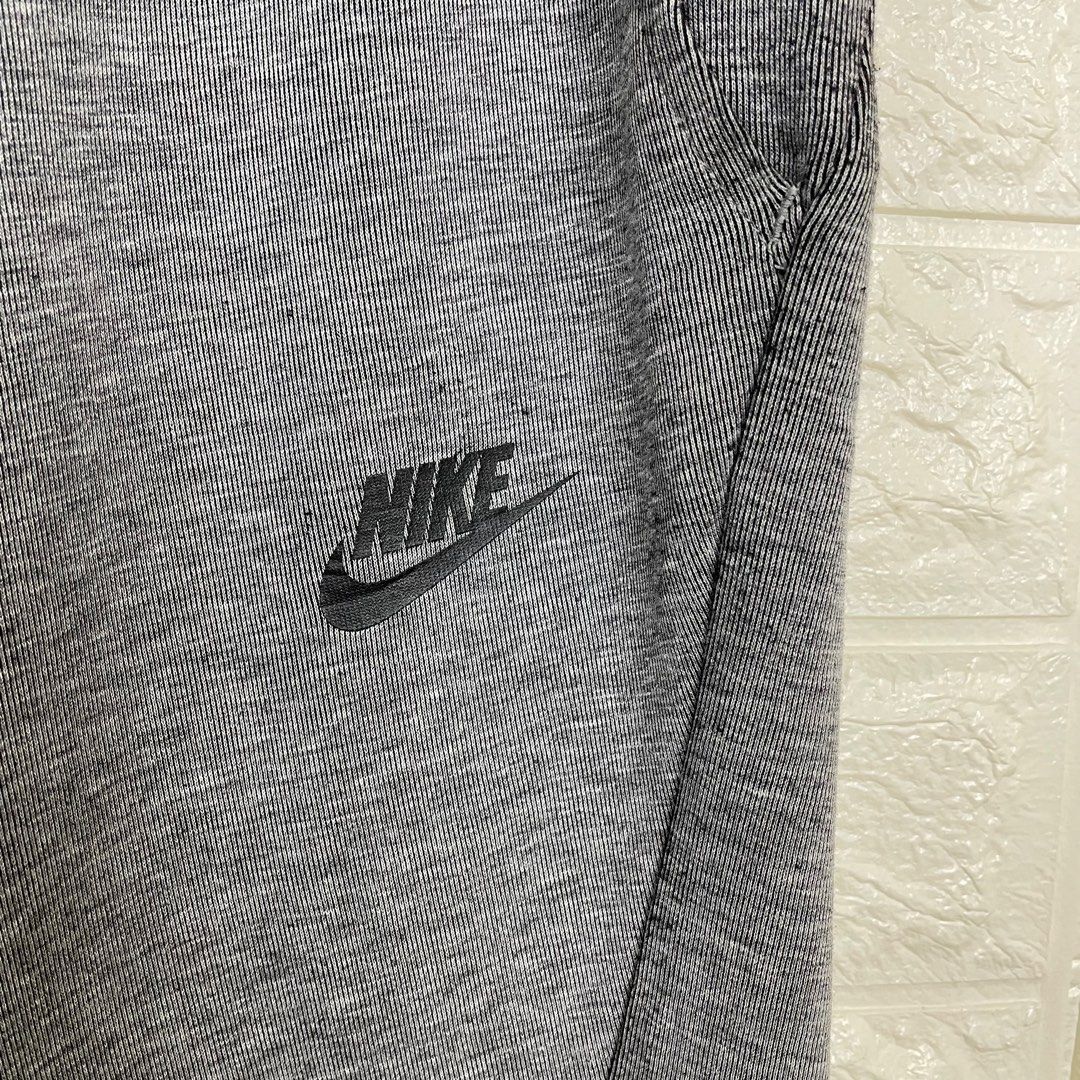 dark gray nike tech fleece