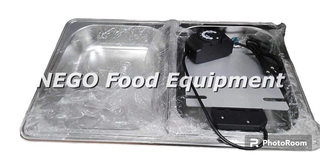 Electric Chafing Dish (Category: Other Kitchen Appliances) located in Las Pinas. Submitted by negofexpress (Listing ID 1261094722, Image 2). Description: Product Details 1) Brand new 2) This roll top food heater features a sturdy stainless steel frame for a long service life 3) Capacity provides plenty of space for lots of food 4) The roller blind can be opened 180 degrees for easy operation 5) It comes with a food container, water tank and elect