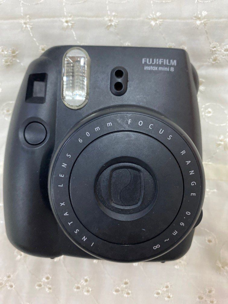Fujifilm Instax Mini 8 Black (Category: Cameras) located in Quezon City. Submitted by any.every (Listing ID 1261059588, Image 1). Description: NOT SURE IF IT TURNS ON MIGHT NEED MINOR REPAIR PLEASE DO NOT ASK WHAT THE ISSUE IS. NAKASULAT NA DITO.