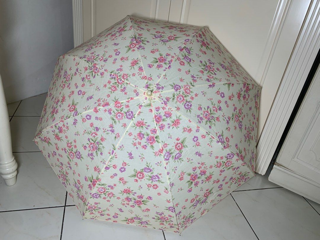 Metrocity floral parasol (Category: Umbrellas) located in Angeles City. Submitted by seol1108 (Listing ID 1261025577, Image 2). Description: Authentic Metrocity. Used once and kept only. Good condition..