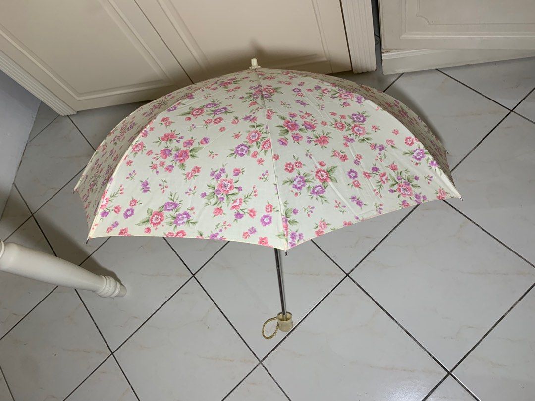 Metrocity floral parasol (Category: Umbrellas) located in Angeles City. Submitted by seol1108 (Listing ID 1261025577, Image 1). Description: Authentic Metrocity. Used once and kept only. Good condition..
