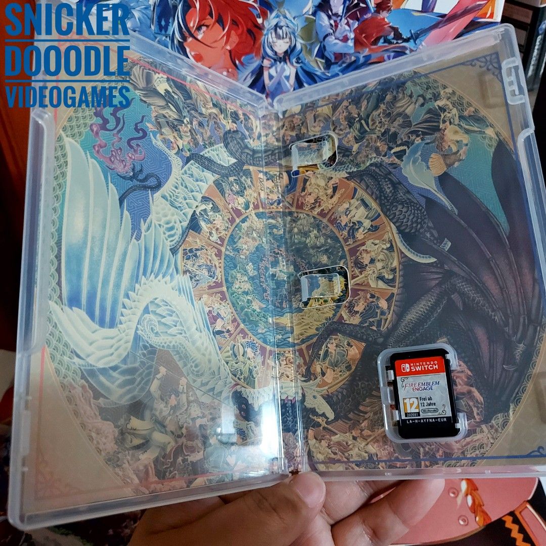 NSW Fire Emblem Engage Divine Edition Boxed Set MINT (Category: Nintendo) located in Manila. Submitted by watchesvideogamestoys (Listing ID 1261033749, Image 3). Description: FOR SALE: Nintendo Switch Fire Emblem Engage Divine Edition Boxed Set MINT Item Details: - Game is in good working condition - Guaranteed tested working - Box condition 9.5/10 - Complete in box - Art book is sealed INCLUSIONS: - Game card - Steel book - Art cards - Artbook -