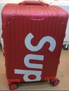 Supreme cheap luggage fake
