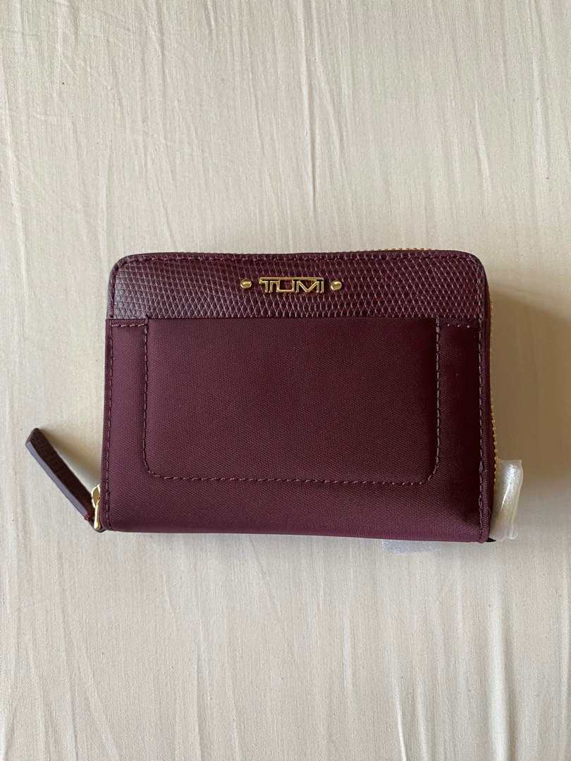 Tumi tri fold zip around on sale