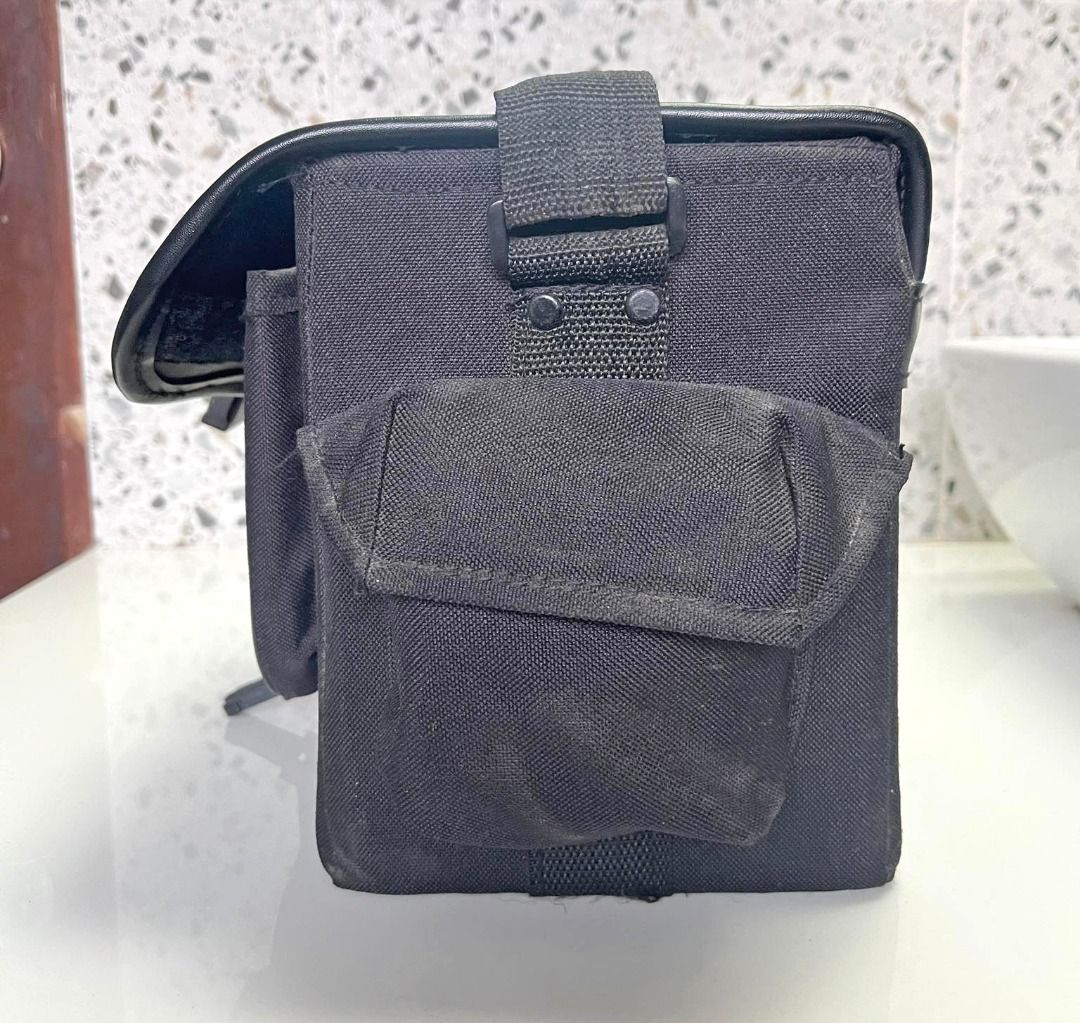 Vintage Sony camera bag (Category: Camera Bags & Carriers) located in Quezon City. Submitted by sustainable.sarah (Listing ID 1261049660, Image 3). Description: Vintage Sony camera bag 8" height x 7" width x 11" length Black color. Has 2 side pockets and 1 front pocket. Complete straps and locks Only flaw is that it's missing a foot, see 6th image. Might need a bit of cleaning as well, but nonetheless, still in mint condition..