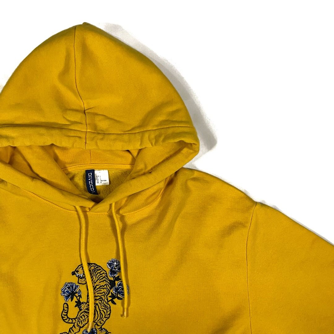 H&m yellow tiger best sale hoodie