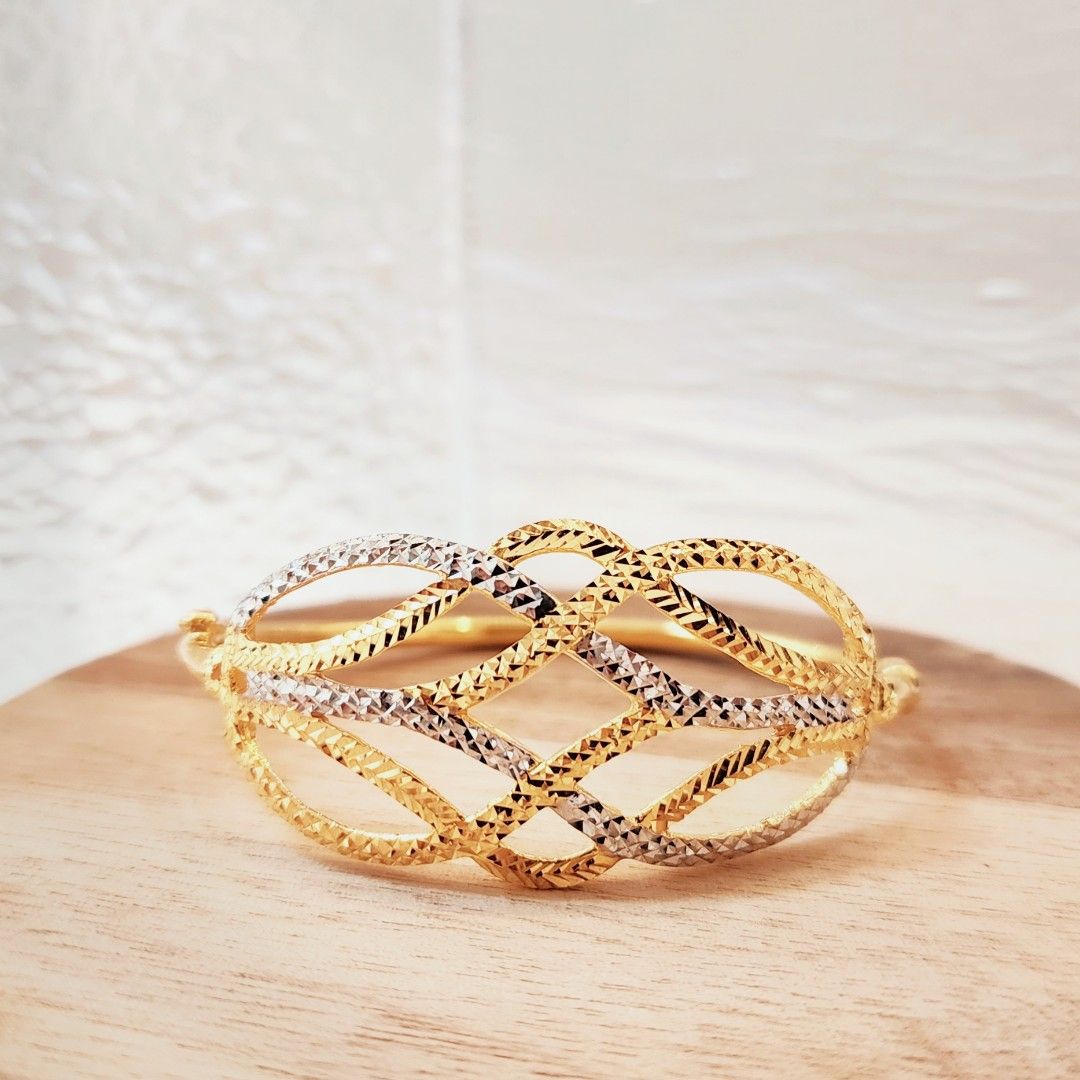 Gold bracelet with ring sale design