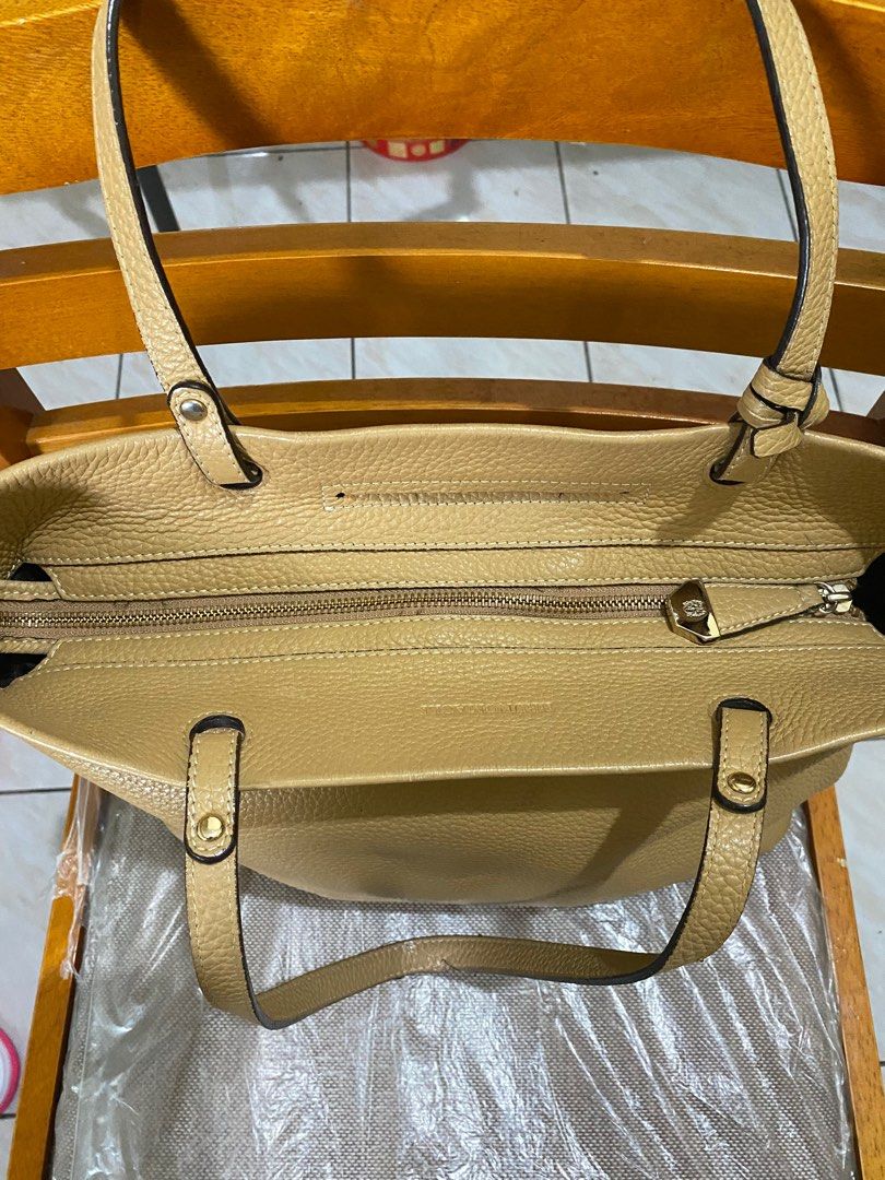 Bruno Magli Tote Bag (Category: Tote Bags) located in Makati City. Submitted by secondlyf (Listing ID 1261155118, Image 3). Description: Soft pebbled genuine leather Size medium - large Caramel - beige color Hardware is light gold No flaws Delivery will be paid by the buyer.