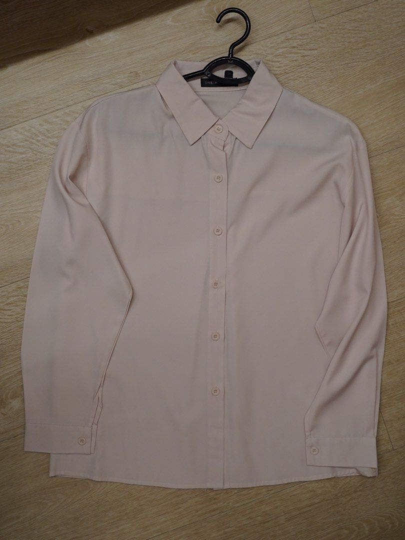 beige button up shirt