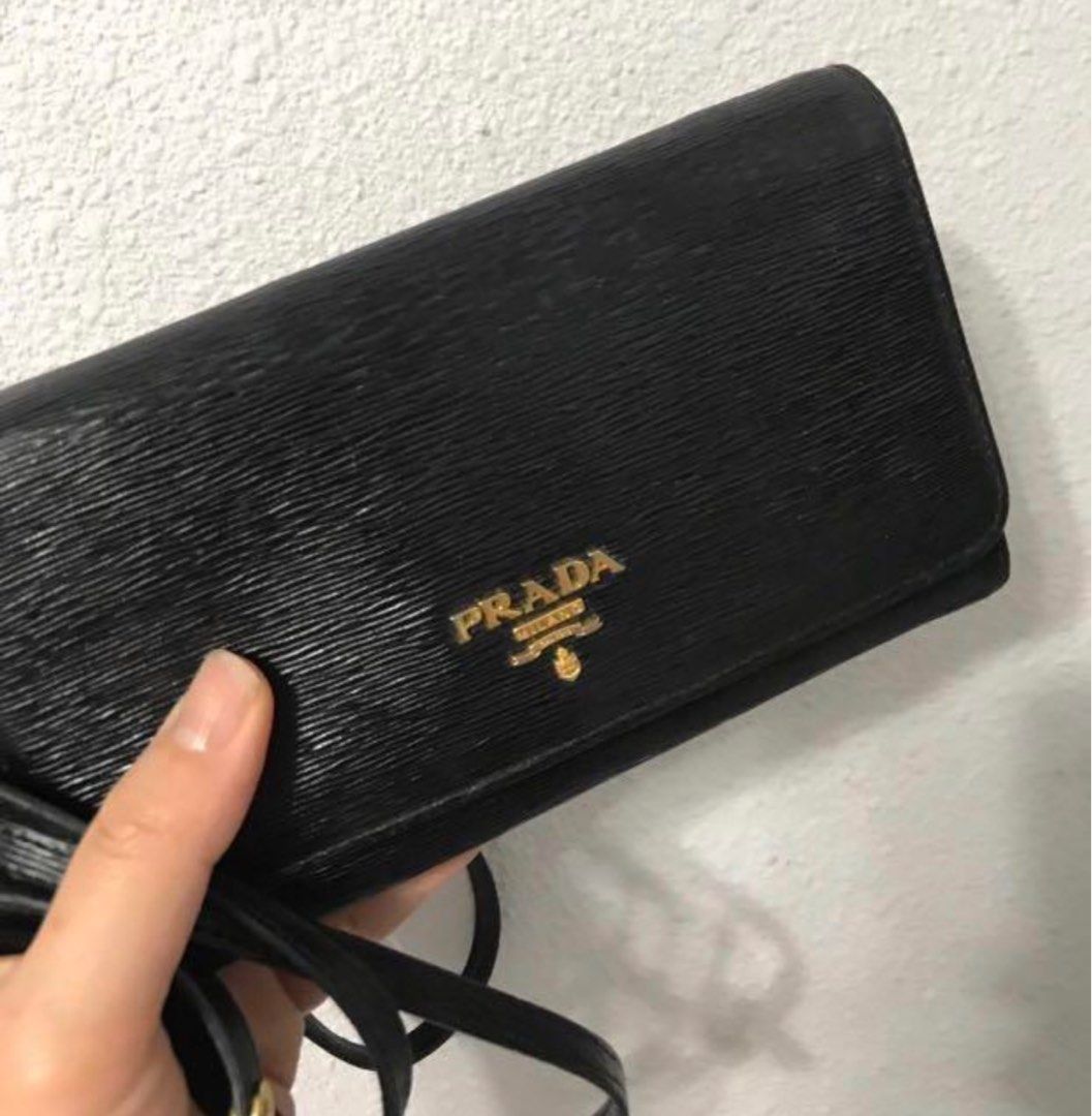 Authentic prada zippy wallet, Luxury, Bags & Wallets on Carousell