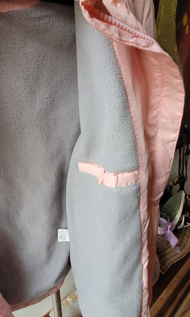 Lightweight Coat (Category: Babies & Kids Fashion) located in Singapore. Submitted by nippy (Listing ID 1261237255, Image 3). Description: Water resistant outer Super soft fleece lining Removable hood Unique feature: Adjustable Drawstring hem to keep the wind out Suitable for aircondioned room or autumn climate. Pls check measurements here! :) Length 25" Sleeve 21.5" Chest 18" Would also fit a petite lady..