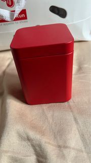 Empty red tin can