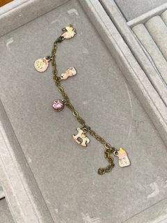 gold bracelet with baby pendants