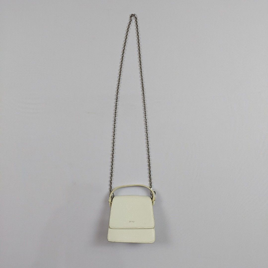 JW PEI - Vegan Leather Mini Chain - Bag (Category: Luxury Bags & Wallets) located in Dasmarinas. Submitted by F_A_Q (Listing ID 1261190101, Image 1). Description: ONE SIZE - 4.5 In. Width - 4.5 In. Length Rank AB No Issue No Inclusion just the bag itself - 100% Vegan Leather.