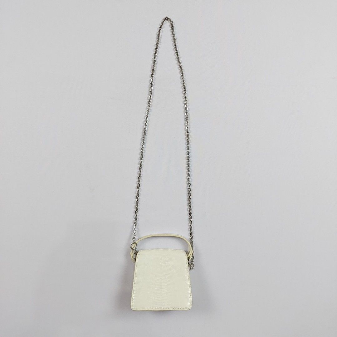 JW PEI - Vegan Leather Mini Chain - Bag (Category: Luxury Bags & Wallets) located in Dasmarinas. Submitted by F_A_Q (Listing ID 1261190101, Image 2). Description: ONE SIZE - 4.5 In. Width - 4.5 In. Length Rank AB No Issue No Inclusion just the bag itself - 100% Vegan Leather.