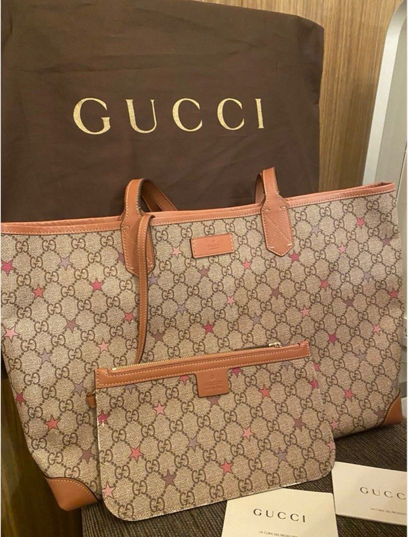 Gucci logo supreme canvas tote hotsell