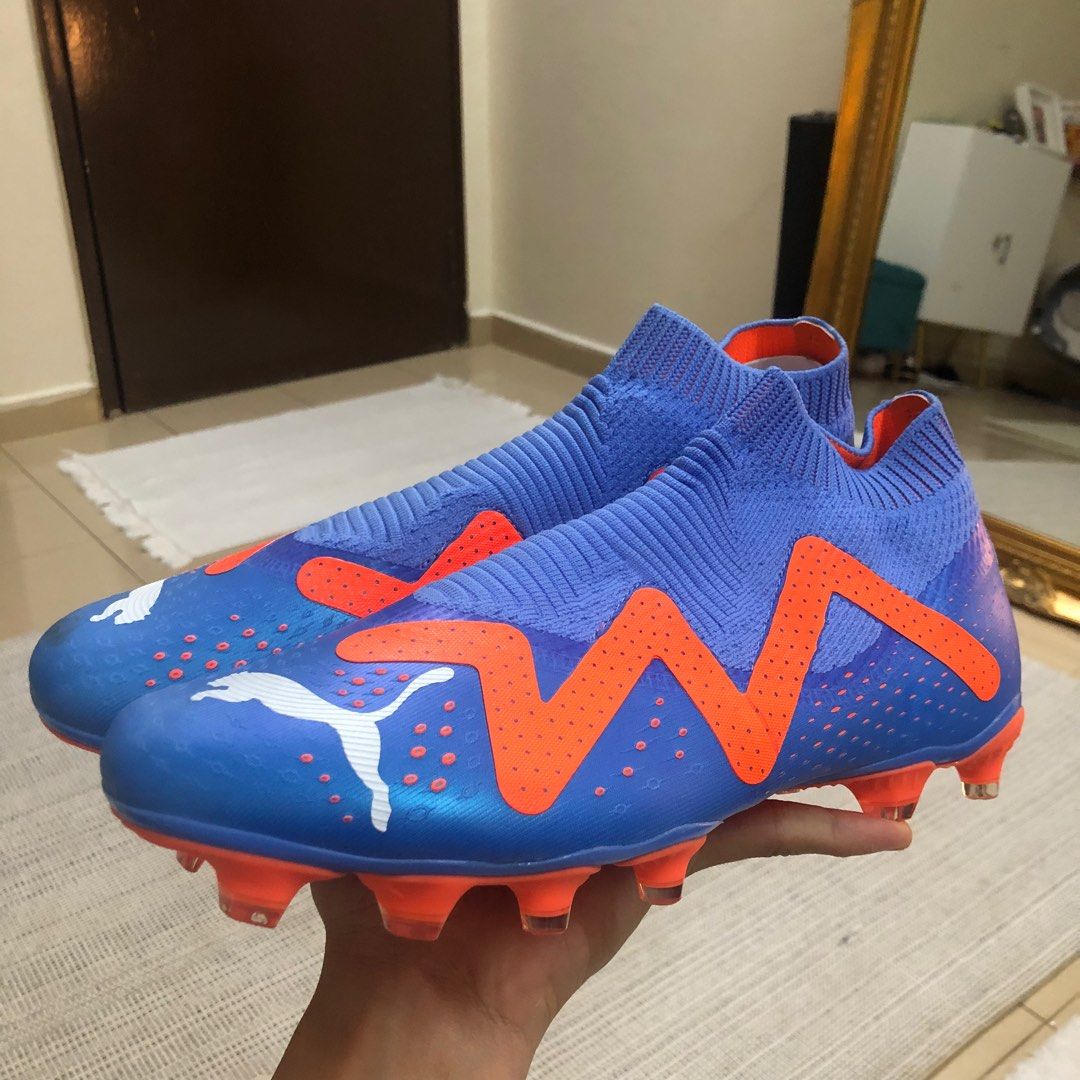Blue puma football boots 2025
