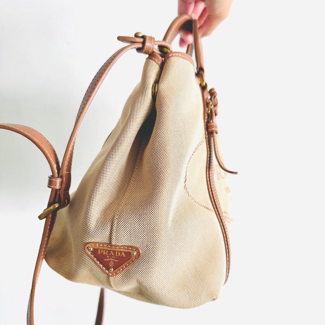 Prada canvas sling bag sales