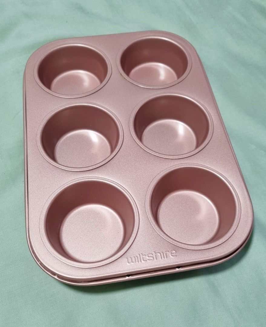 https://media.karousell.com/media/photos/products/2023/10/21/wiltshire_muffin_pan_6cup_1697883166_5c447677_progressive.jpg