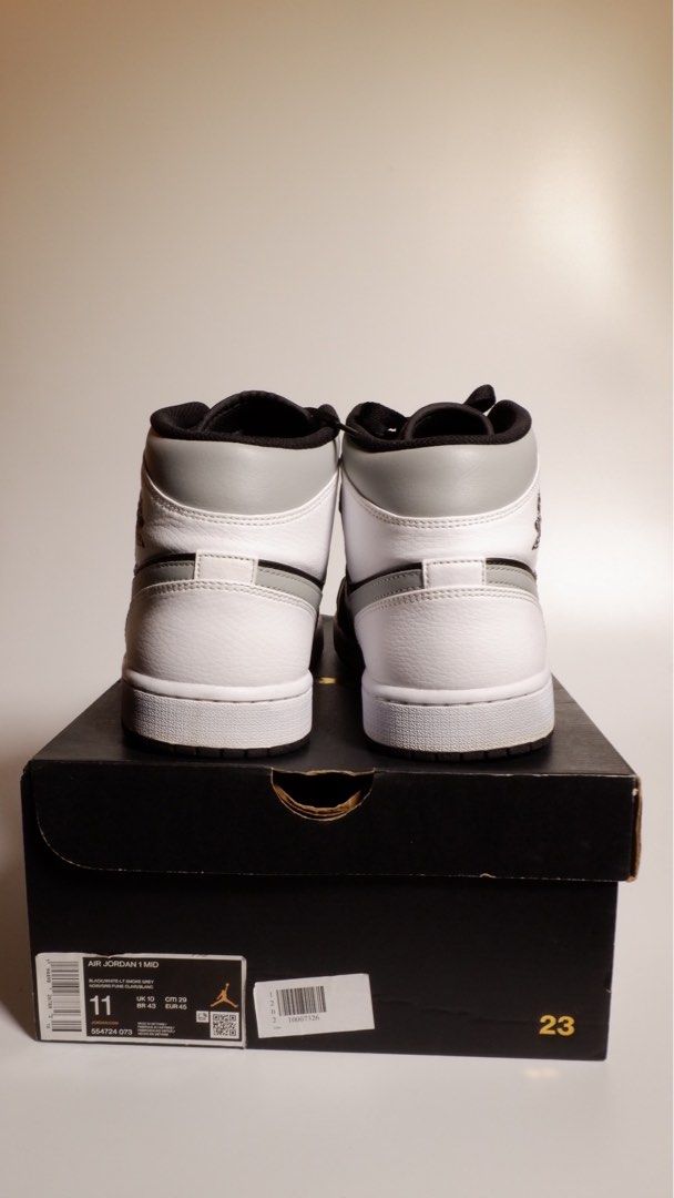 Air Jordan 1 Mid "White Shadow" (Black/Light Smoke Gray) (Category: Sneakers) located in Las Pinas. Submitted by taureandeclutter (Listing ID 1261354530, Image 2). Description: Inspired by the first AJ1, offering OG fans a look at how far Jordan brand has become since 1985. Color Shown: Black/Light Smoke Gray/White Style: 554724-073 ORIGINAL! Bought at Nike Store in Abu Dhabi. Open to meet up if need to check the item. ***Negotiable***.